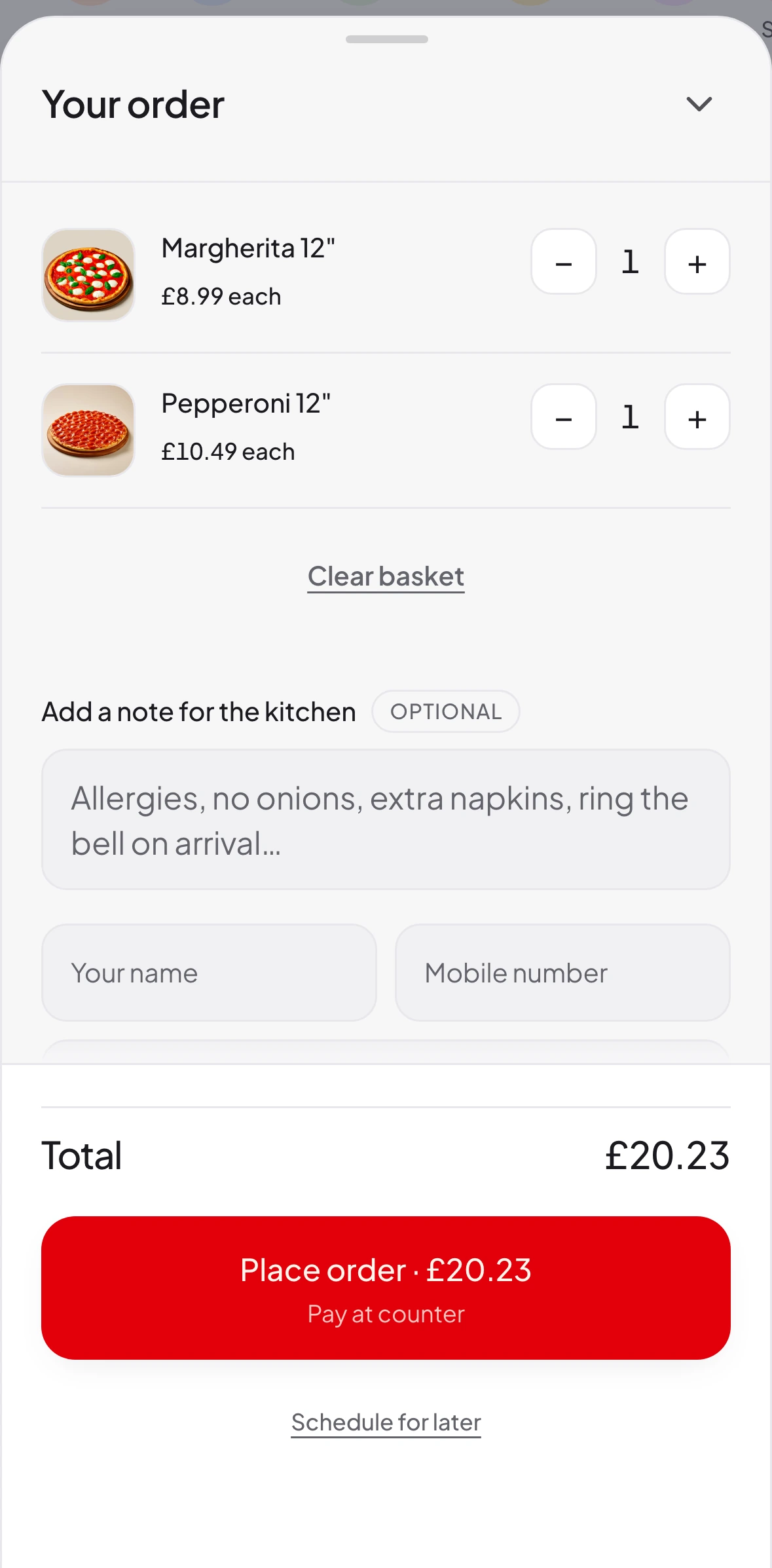 The basket with two pizzas, total £20.23 including the 75p service charge